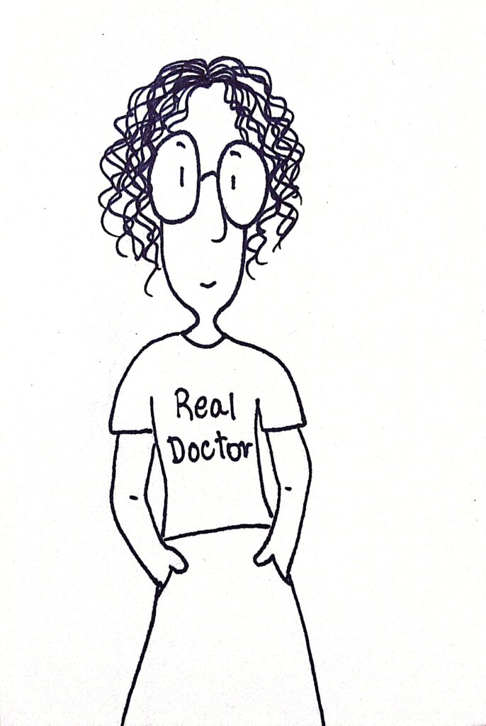 Melina com a camiseta com a descrição "Real Doctor"